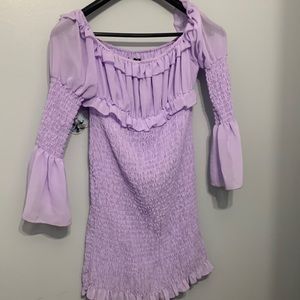 This dress is purple and is from pretty little thing